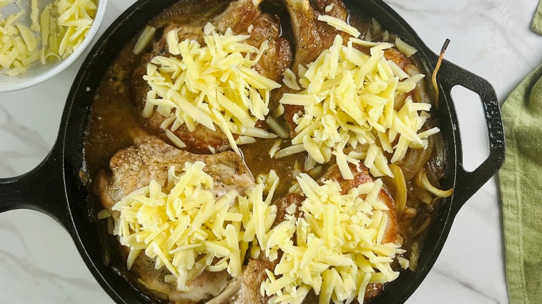 pork chops with shredded cheese