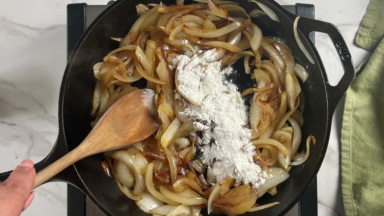 onions and flour in skillet