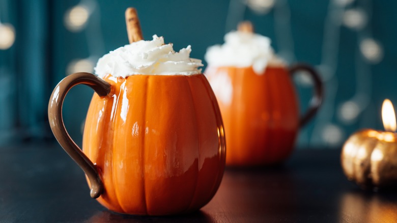 pumpkin lattes in pumpkin mugs