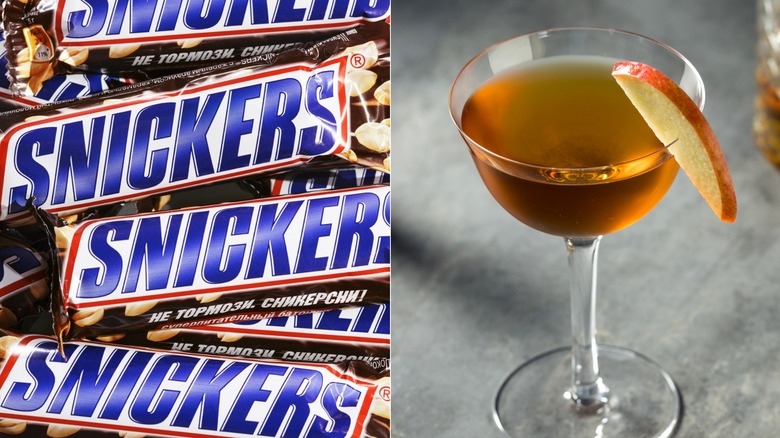 Snickers candy bars and glass of apple brandy