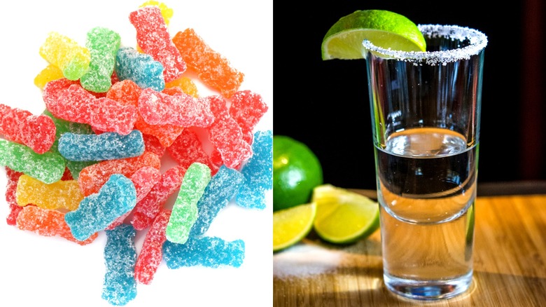 Sour Patch Kids candy and tequila shot glass