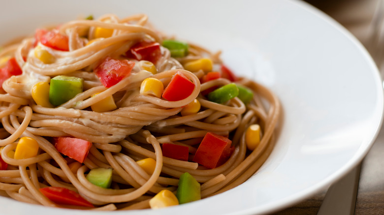 Pasta with tahini sauce and vegetables