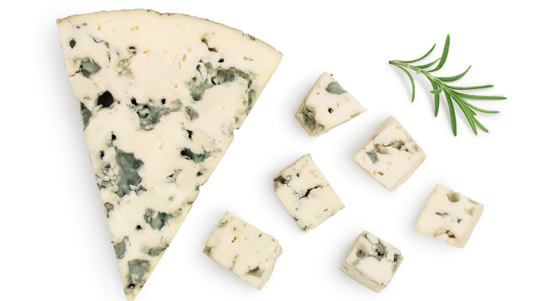 slice and cubes of blue cheese 