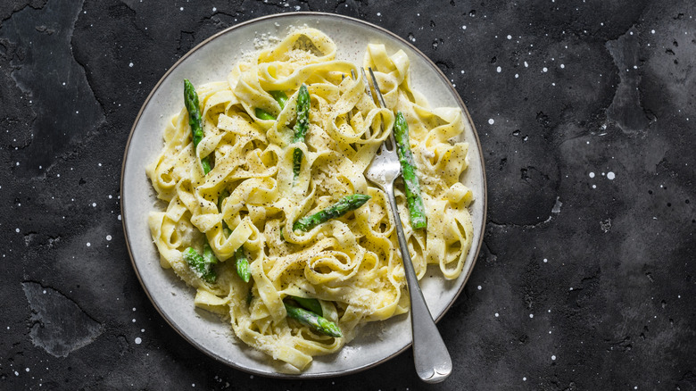 pasta with asparagus on plate