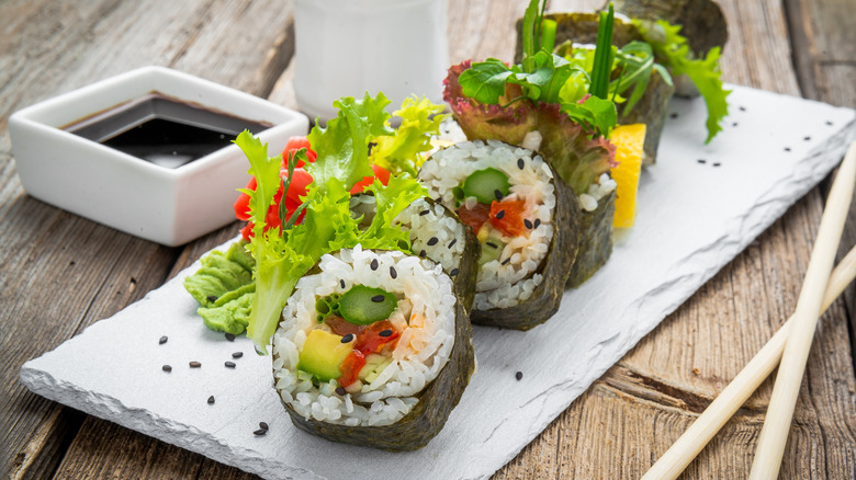 vegan sushi rolls on plate 