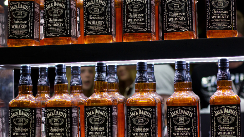jack daniels whiskey bottles shelves