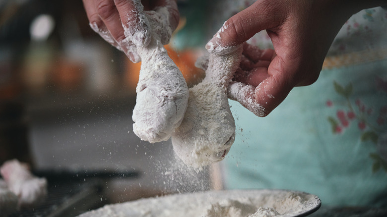 covering chicken in flour