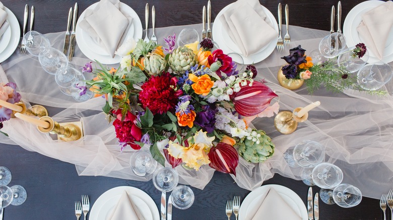 Dinner table with colorful bouquet