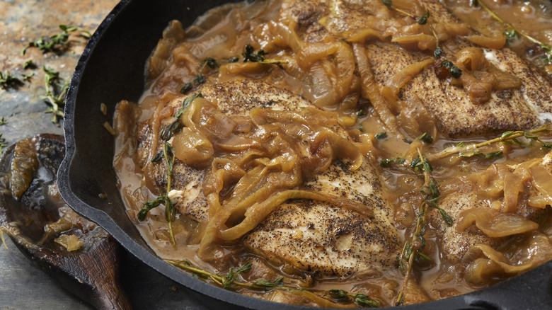 Chicken topped with caramelized onions