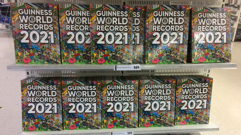 Guinness Book of World Records on shelf