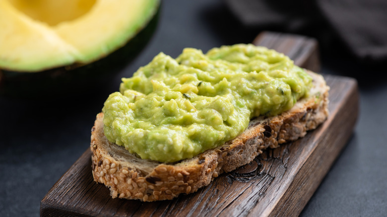 avocado toast on wood board