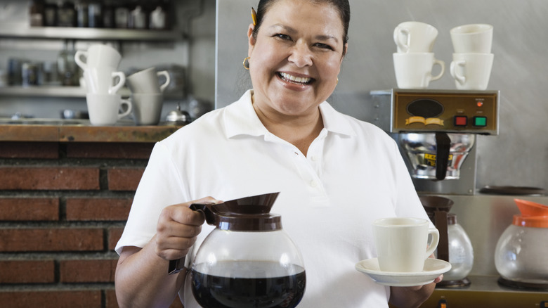 waitress serving coffee