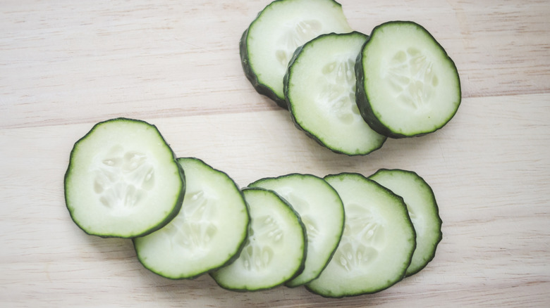 sliced cucumbers on a table