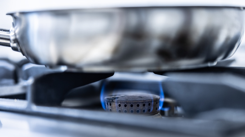 Stove burner with pan on top