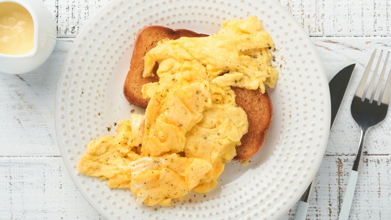 Fluffy scrambled eggs on toast