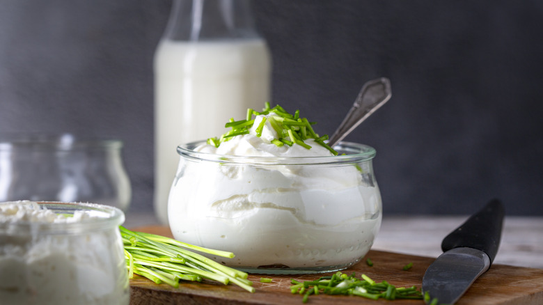 sour cream with chives in jar