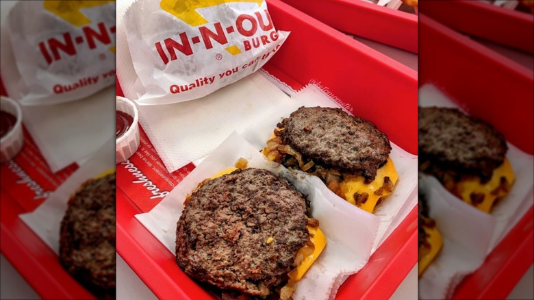 Two Flying Dutchmen from In-N-Out on white napkins in a red tray