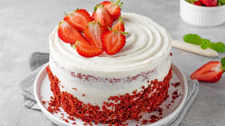 Frosted cake with strawberries