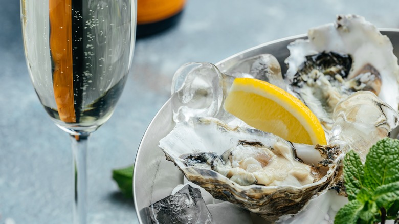 oysters on a half shell with sparkling wine