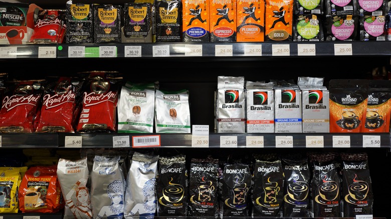 Bags of coffee on grocery shelf