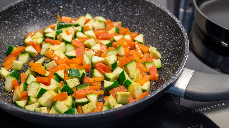 vegetables cooking in a pan