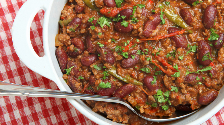 chili in bowl with spoon