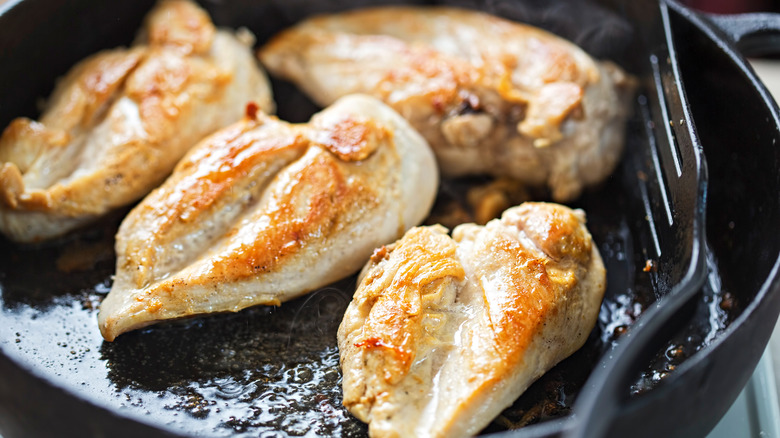 Chicken breasts in frying pan