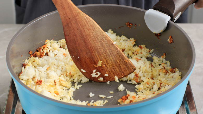 Rice frying in pan