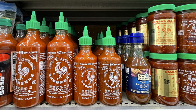 Sriracha bottles with other Asian hot sauces