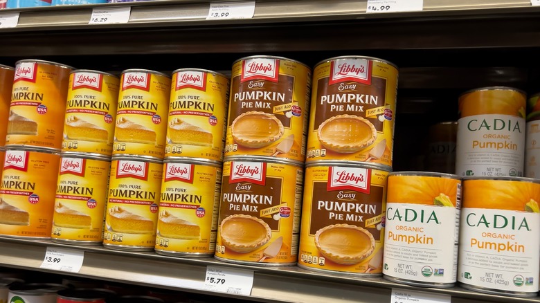 grocery shelf with canned pumpkin