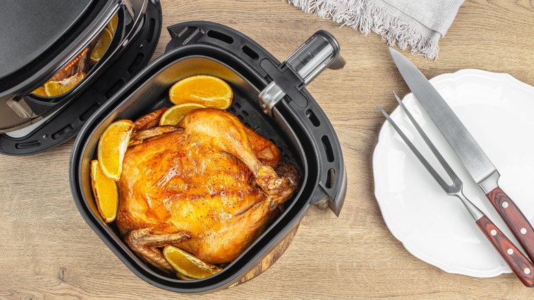 Roasted chicken in an air fryer basket