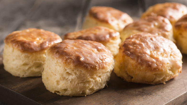 Fresh buttery biscuits on cutting board