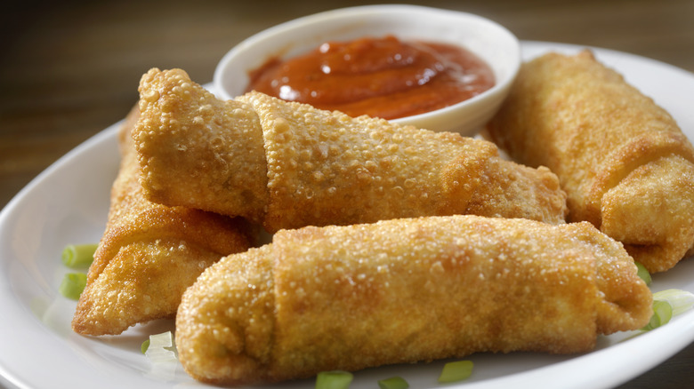 Homemade egg rolls with dipping sacue