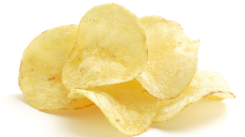 a handful of crispy potato chips