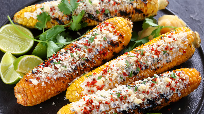 grilled corn topped with classic elote toppings