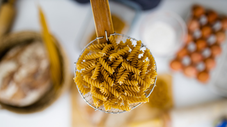 dried pasta in pasta spider