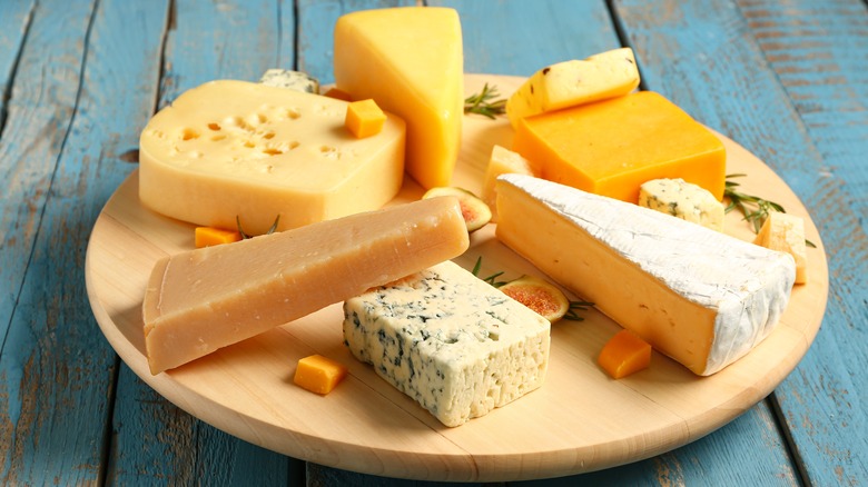 Various cheese on board