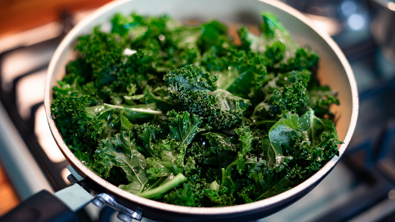 Kale cooking in pan