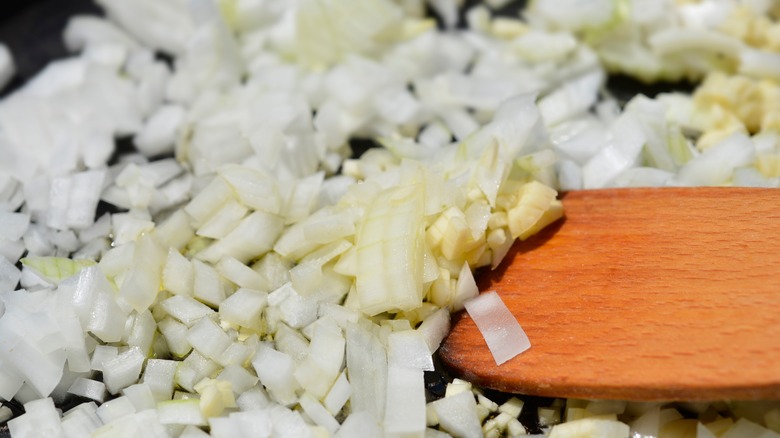 Sautéing chopped onions and garlic