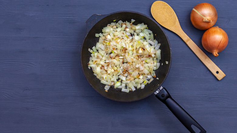 Diced onions in frying pan