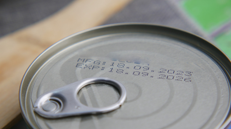 Manufacturing and expiration dates printed on top of can