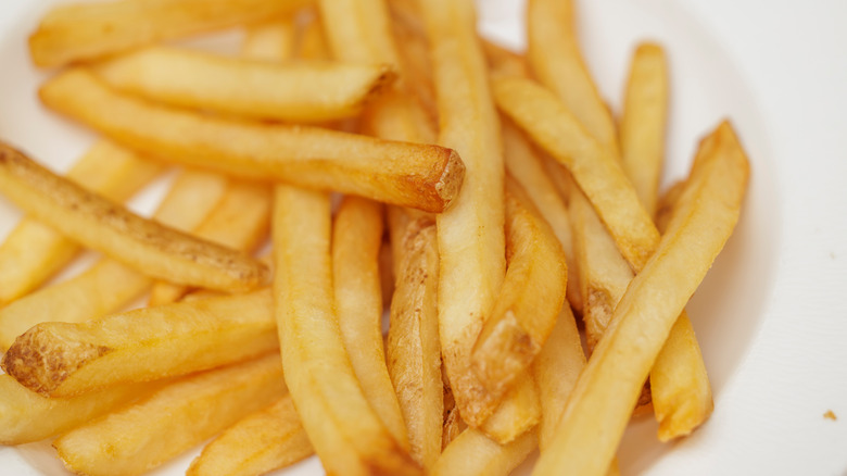 French fries on white plate