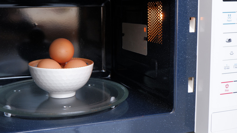 Bowl of eggs in microwave