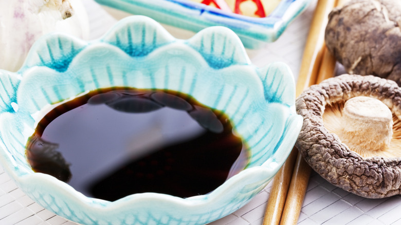 a bowl of soy sauce