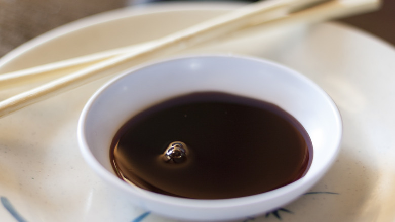 a bowl of soy sauce