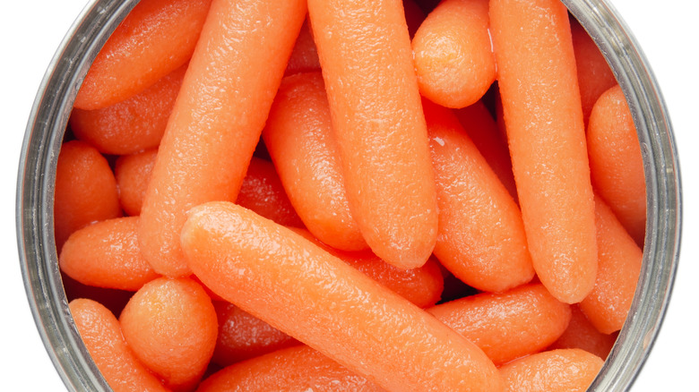 Overhead view of opened can of carrots