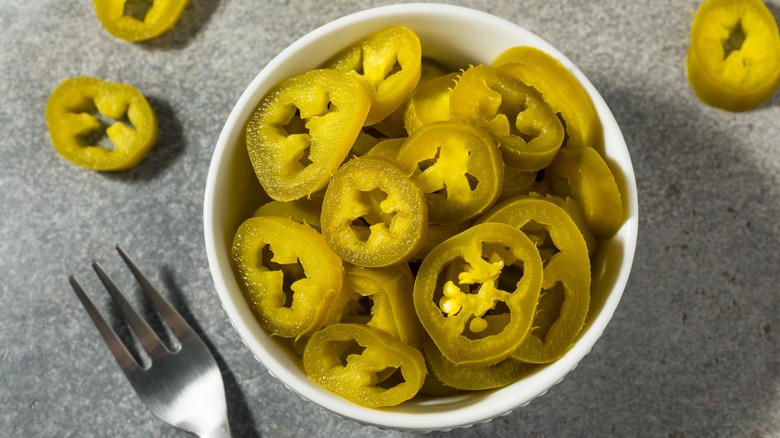 Small bowl of sliced jalapenos