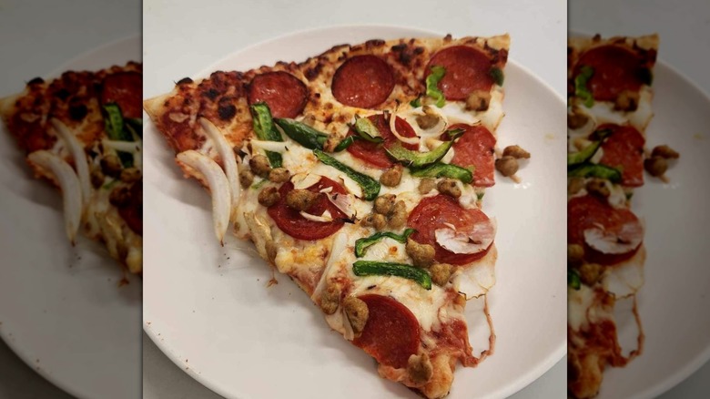 Slice of Costco combo pizza