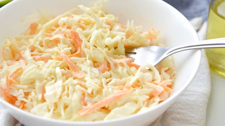 bowl of coleslaw with fork