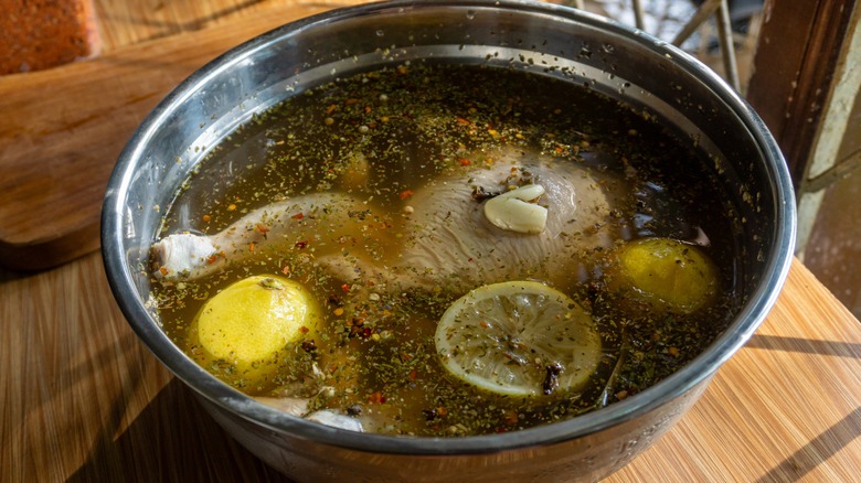 brining chicken in bowl